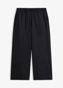 Wygodne spodnie sportowe z szeroką nogawką, szybkoschnące. Zielone spodnie dresowe bonprix, bez wzorów. Za 47,99 zł.