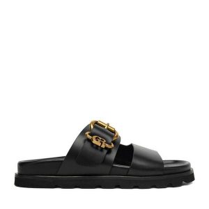 Klapki GINO ROSSI. Czarne klapki Gino Rossi, bez wzorów, bez obcasa. Za 329,99 zł.