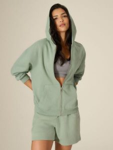 4F Bluza loose z kapturem damska - zielona XS. Zielone bluzy 4f, xs, bez wzorów, z dzianiny, z kapturem. Za 179,99 zł.