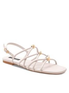 Nine West Sandały 123AL1737 Biały. Białe sandały Nine West, bez wzorów, ze skóry, bez obcasa, na płaskiej podeszwie, bez zapięcia. Za 159,99 zł.