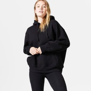 Bluza z kapturem damska Domyos Gym & Pilates 520 Oversize. Zielone bluzy DOMYOS, xl, bez wzorów, z bawełny, z kapturem. W wyprzedaży za 79,99 zł.