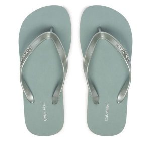 Japonki Calvin Klein. Zielone klapki Calvin Klein, bez wzorów, bez obcasa. Za 149,99 zł.