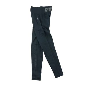Second life - Legginsy damskie Flex High Gymshark czarne - Jak nowy. Czarne legginsy Gymshark, bez wzorów, z materiału. Za 106,46 zł.