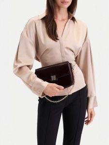 Nine West Torebka CEO-NW-M-001-10 Bordowy. Czerwone torebki wieczorowe Nine West, bez wzorów, ze skóry, bez dodatków. Za 179,99 zł.