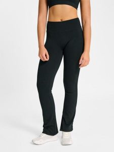 Damskie legginsy Hummel Hiit Seamless Flare. Czarne legginsy Hummel, bez wzorów, z materiału. Za 279,50 zł.