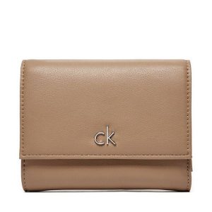 Portfel Calvin Klein. Brązowe portfele Calvin Klein, bez wzorów. Za 159,99 zł.
