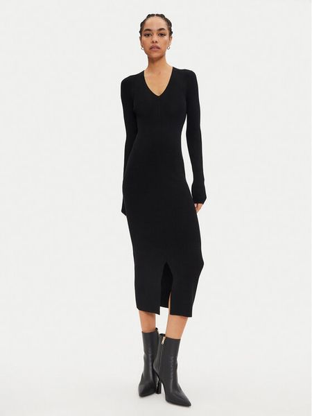 Calvin Klein Sukienka dzianinowa K20K207491 Czarny Slim Fit. Czarne kombinezony Calvin Klein, m, bez wzorów, z dzianiny, bez kołnierzyka, bez ramiączek. Za 529,99 zł.