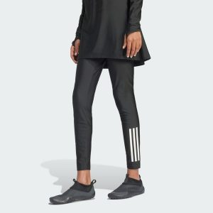 Legginsy 3-Stripes Swim. Czarne legginsy ADIDAS, bez wzorów. Za 299,00 zł.