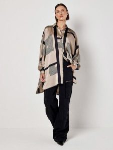 Apricot Bluzka w kolorze beżowo-czarnym rozmiar: XS. Brązowe bluzki Apricot, xs, bez wzorów, bez kołnierzyka, bez ramiączek. Za 66,16 zł.