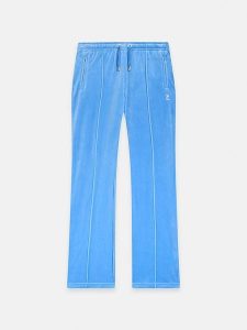 Juicy Couture Spodnie dresowe w kolorze błękitnym rozmiar: M. Niebieskie spodnie dresowe Juicy Couture, m, bez wzorów, z dresówki. Za 146,28 zł.