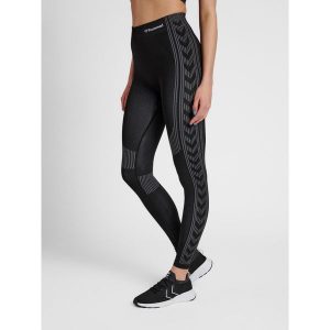 Damskie legginsy ze średnim stanem Hummel Shaping. Czarne legginsy Hummel, bez wzorów, z materiału. Za 128,00 zł.