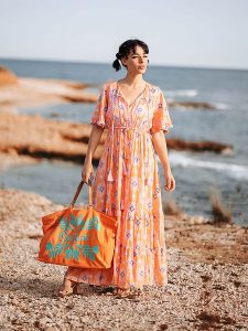Isla Bonita by SIGRIS Sukienka w kolorze pomarańczowym rozmiar: XL. Pomarańczowe sukienki Isla Bonita by SIGRIS, na co dzień, xl, bez wzorów, z bawełny, bez kołnierzyka, bez ramiączek, maxi, proste. Za 154,07 zł.