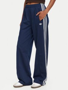 Adidas Spodnie dresowe Firebird KV5403 Niebieski Loose Fit. Niebieskie spodnie dresowe ADIDAS, xl, bez wzorów, z dresówki. Za 299,99 zł.