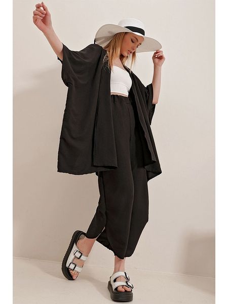 Trend Alacati 2-częściowy zestaw "Trend Alaçat Stili" w kolorze czarnym rozmiar: onesize. Czarne swetry oversize Trend Alacati, bez wzorów, z bawełny, bez ramiączek. Za 110,45 zł.