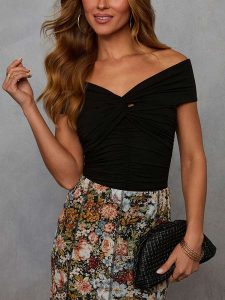 LA Angels Koszulka w kolorze czarnym rozmiar: M. Czarne bluzki LA Angels, m, bez wzorów, bez kołnierzyka, bez ramiączek. Za 118,56 zł.