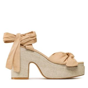 Sandały DeeZee. Brązowe sandały DeeZee, bez wzorów, bez obcasa, na słupku, bez zapięcia. Za 179,99 zł.