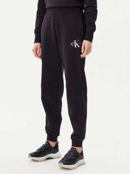 Calvin Klein Jeans Spodnie dresowe Monologo J20J225354 Czarny Slim Fit. Czarne spodnie dresowe Calvin Klein Jeans, s, bez wzorów, z bawełny. Za 219,99 zł.