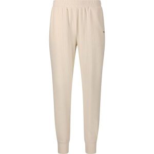 Damskie spodnie dresowe Athlecia Hecey. Białe spodnie dresowe Athlecia, bez wzorów, z dresówki. Za 195,00 zł.