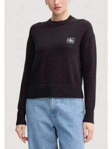 Calvin Klein Jeans Sweter CK EMBRO BADGE SWEAT Czarny Sweat Fit. Czarne swetry klasyczne Calvin Klein Jeans, xxl, z jeansu, bez kołnierzyka. Za 389,99 zł.