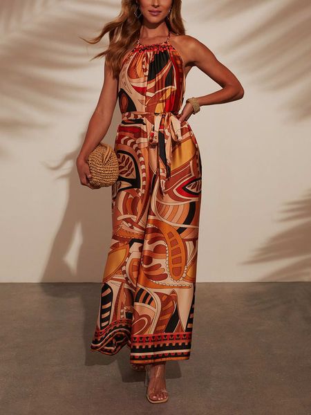 Milan Kiss Kombinezon ze wzorem rozmiar: XL. Kombinezony Milan Kiss, xl, bez wzorów, bez kołnierzyka, bez ramiączek. Za 144,58 zł.