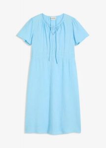 Sukienka tunikowa z bawełnianego muślinu. Niebieskie sukienki bonprix, bez wzorów, z bawełny, bez kołnierzyka, bez ramiączek. Za 119,99 zł.