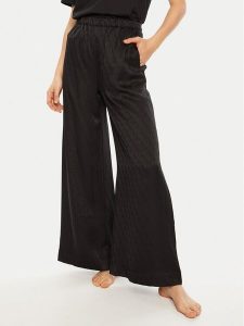 Calvin Klein Spodnie piżamowe 000QS7304E Czarny Relaxed Fit. Czarne piżamy Calvin Klein, bez wzorów, z syntetyku, bez ramiączek. Za 219,99 zł.