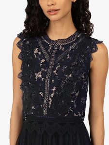 APART Top w kolorze granatowym rozmiar: 38. Niebieskie topy Apart, bez wzorów, z koronki, bez kołnierzyka, bez ramiączek. Za 189,29 zł.