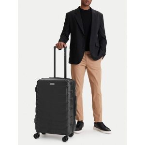 Walizka średnia GINO ROSSI. Czarne walizki Gino Rossi, bez wzorów, średnie. Za 279,99 zł.