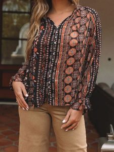 Milan Kiss Bluzka w kolorze czarno-brązowym rozmiar: M. Brązowe bluzki Milan Kiss, m, bez wzorów, bez kołnierzyka, bez ramiączek. Za 130,99 zł.