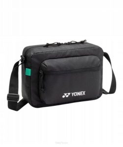 Saszetka sportowa Yonex Team Shoulder Bag. Czarne nerki i saszetki YONEX, bez wzorów, z syntetyku. Za 109,00 zł.