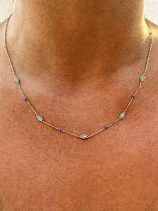 Nomad Pozłacany naszyjnik z elementami ozdobnymi - dł. 39 cm rozmiar: onesize. Niebieskie naszyjniki Nomad, pozłacane. Za 150,45 zł.