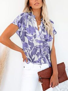 Milan Kiss Bluzka w kolorze biało-fioletowym rozmiar: L. Białe bluzki Milan Kiss, l, bez wzorów, bez kołnierzyka, bez ramiączek. Za 119,12 zł.