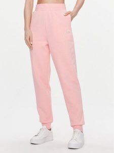 Puma Spodnie dresowe Ess+ Embroidery 670007 Różowy Regular Fit. Czerwone spodnie dresowe Puma, xl, bez wzorów, z dresówki. Za 139,99 zł.