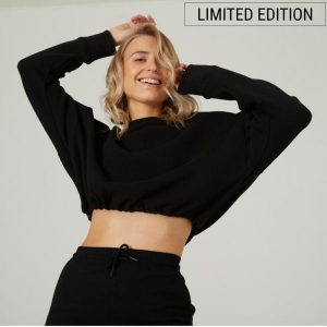 Bluza damska Domyos Gym & Pilates crop. Czarne bluzy DOMYOS, l, bez wzorów, z bawełny, bez kaptura. W wyprzedaży za 59,99 zł.