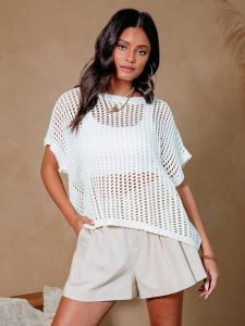 Milan Kiss Sweter w kolorze białym rozmiar: L. Białe swetry oversize Milan Kiss, l, bez wzorów, ze splotem, bez ramiączek. Za 135,49 zł.