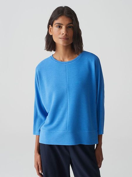 OPUS Bluzka w kolorze błękitnym rozmiar: 38. Niebieskie bluzki Opus, bez wzorów, bez kołnierzyka, bez ramiączek. Za 96,37 zł.