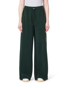 Scotch & Soda Spodnie w kolorze ciemnozielonym rozmiar: M. Zielone spodnie z wysokim stanem Scotch & Soda, bez wzorów, z materiału, z podwyższonym stanem. Za 224,95 zł.